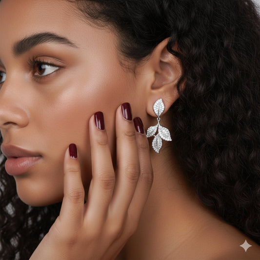 Elegant silver leaf drop earrings with crystal accents for women