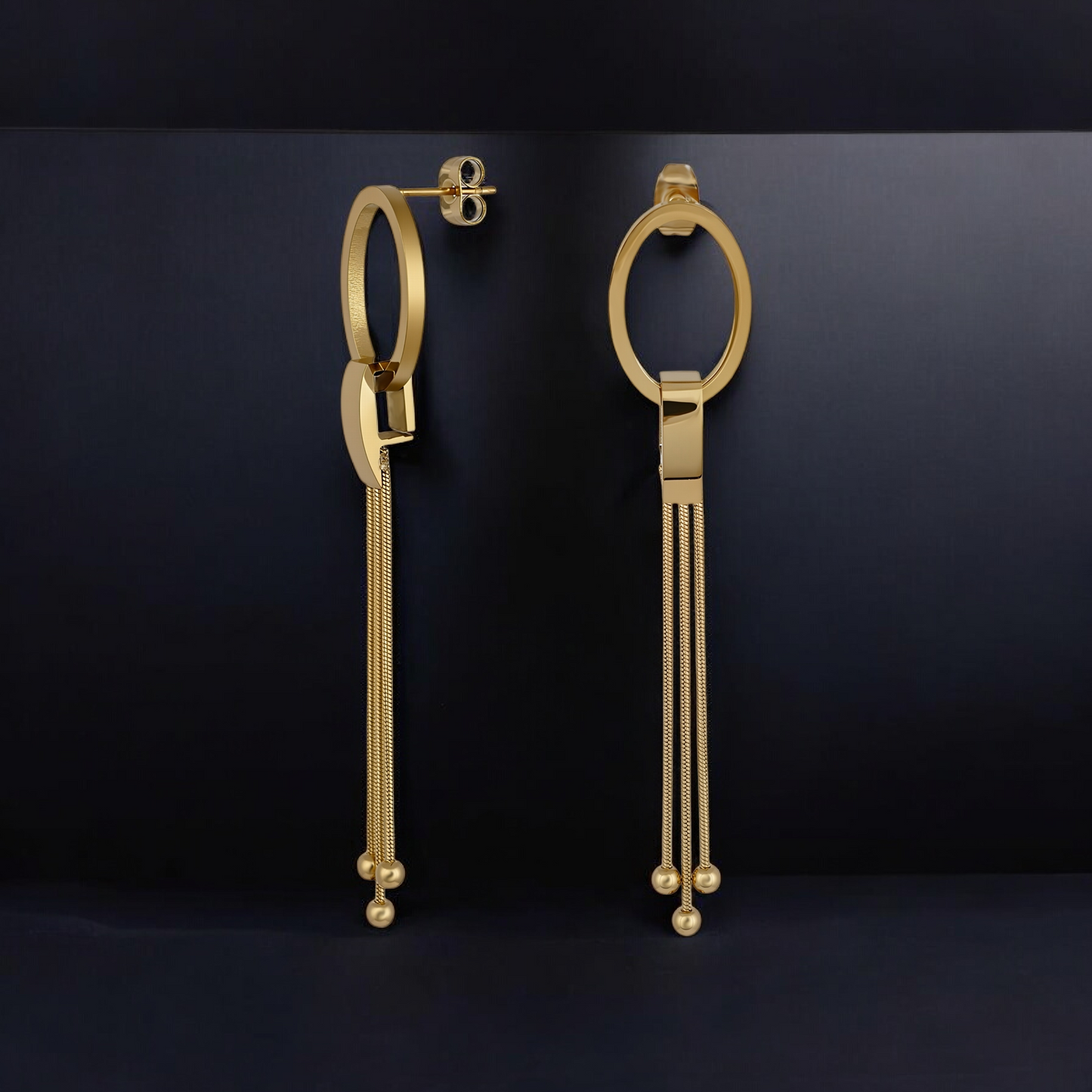 Gold oval drop earrings with chain tassels